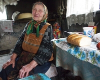 Washenok near a food laden table